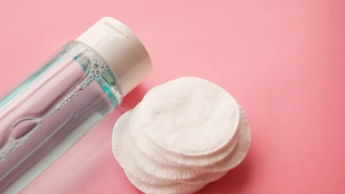 Micellar water removing makeup stains from clothes